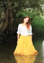 Girl in skirt in water Royalty Free Stock Photo