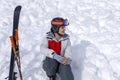 Girl with skis in helmet and mask on the background of mountains Royalty Free Stock Photo