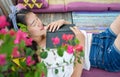 Girl sleeping with a book on the sofa bed Royalty Free Stock Photo