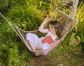 Girl sleeping in a hammock