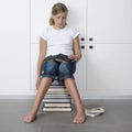 Girl sleeping over her books Royalty Free Stock Photo