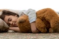 Girl sleeping with teddy bear Royalty Free Stock Photo