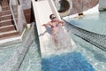 Girl sliding on waterslide