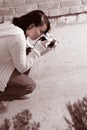 Girl with SLR photo camera Royalty Free Stock Photo