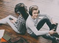 Girl with a smartphone and boy with a tablet Royalty Free Stock Photo