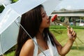 Girl smelling flowers