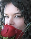 Girl smelling roses