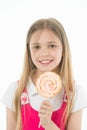 Girl smile with lollipop isolated on white. Small child smiling with candy on stick. Happy kid with swirl caramel. Food