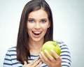 Girl smile with teeth and toothy braces holding green apple Royalty Free Stock Photo