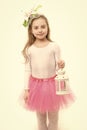 Girl smile with xmas lantern in pink skirt tutu