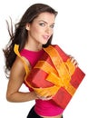 Girl smiles and holding a gift box Royalty Free Stock Photo