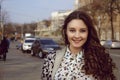 Girl smiling on the background of the city