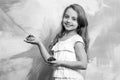 Girl smiling with cupcakes in hands Royalty Free Stock Photo