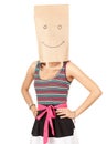 Girl in smiling ecological paper bag on head