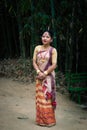 Girl smiling face isolated dressed in traditional wearing on festival with blurred background