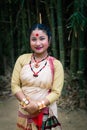 Girl smiling face isolated dressed in traditional wearing on festival with blurred background