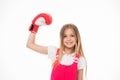 Girl on smiling face posing with boxing glove, isolated on white background. Kid girl with long hair knows how to defend