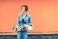 Girl smiling and laughing, skater on a sunny summer day with instragram filter and vintage effect