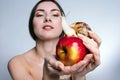 A girl with a snail on the apple Royalty Free Stock Photo