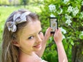 Girl snapshot blossoming tree