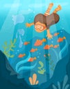 Girl snorkeling. Fish and coral in the sea