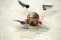 Girl snorkeling in ocean Royalty Free Stock Photo