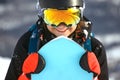 The girl with a snowboard on the ski resort Royalty Free Stock Photo