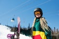 Girl with a snowboard on a snowy slope. Sport. Royalty Free Stock Photo