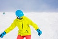 Girl snowboarder having fun in the winter ski resort. Royalty Free Stock Photo