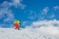 Girl snowboarder having fun in the winter ski resort. Royalty Free Stock Photo