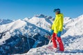 Girl snowboarder having fun in the winter ski resort. Royalty Free Stock Photo