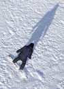 Girl snowboarding in the snow in winter