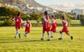 Girl, soccer and fitness team in field sports playing fun game together in training for competition outdoors. Group of Royalty Free Stock Photo