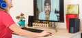 Girl speaking with her boyfriend using web remote platform online during isolation quarantine - Happy young woman laughing while