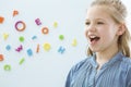 Girl in speech therapy office Royalty Free Stock Photo