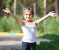 Girl splashing water at the park