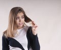 Girl with split hair problem perplexity disappointment Royalty Free Stock Photo