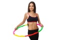 A girl in sport suit with hula hoop isolated on Royalty Free Stock Photo