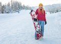 Girl snowboarder smile, winter sport activity