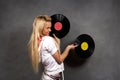 Girl in sports clothes with vinyl Royalty Free Stock Photo