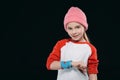 Girl in sportswear with sweatband and fitness tracker isolated on black Royalty Free Stock Photo