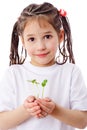 Girl with sprouts in hands Royalty Free Stock Photo