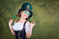 A girl in a St. Patrick costume is smiling. Royalty Free Stock Photo