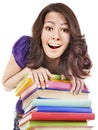 Girl with stack color book .