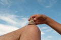 Girl stacking stones Royalty Free Stock Photo