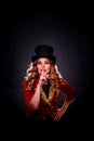 Girl in stage costume and top hat on her head Royalty Free Stock Photo