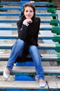 Girl on the stairs on the beach