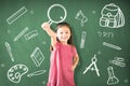 girl standing against chalkboard and education concept