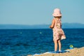 Girl standing on beach. Royalty Free Stock Photo