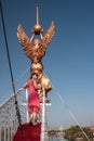 Girl standing on the bow of the ship Royalty Free Stock Photo